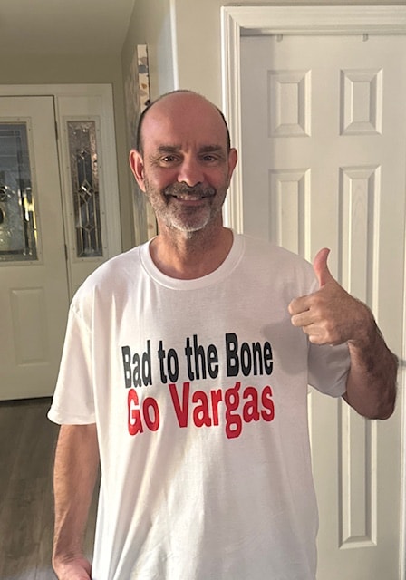 Supporters wearing When They Go Low I Go High campaign shirts